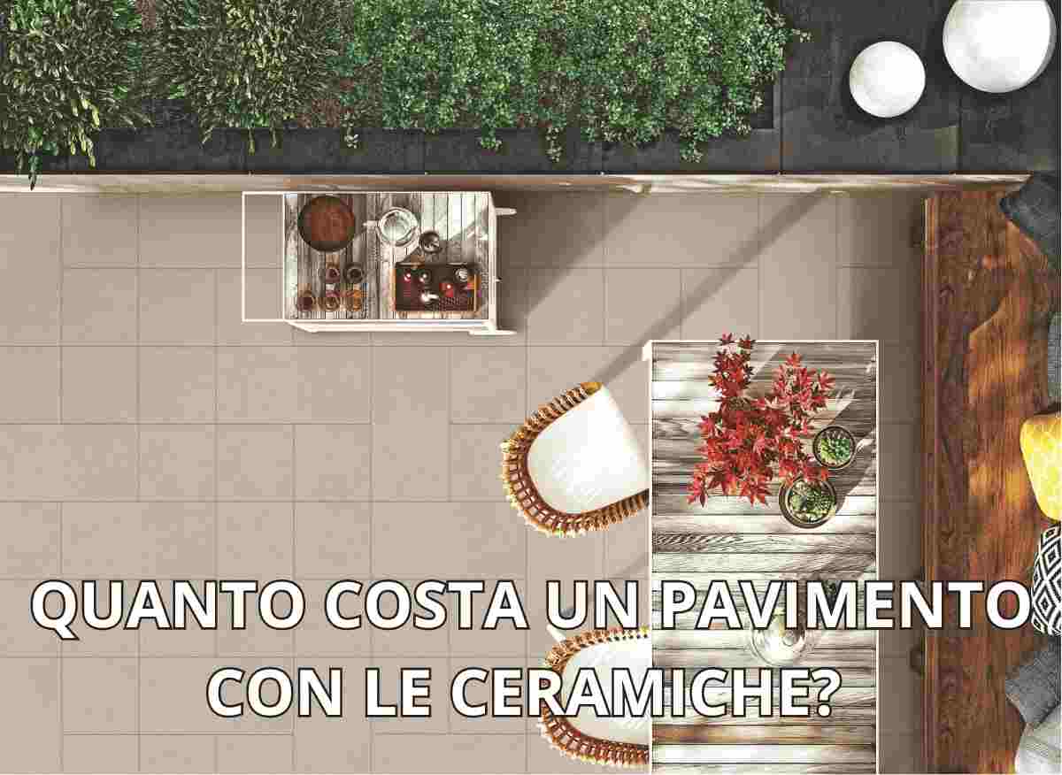 Pavimento con le ceramiche, sedie, tavolo e fiori